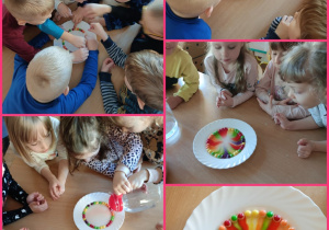 Dzieci tworzą skittlesową tęczę.