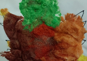 Praca dziecka - liść pomalowany rosnącymi farbami